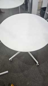 Gas lifted White Round table on lockable wheels