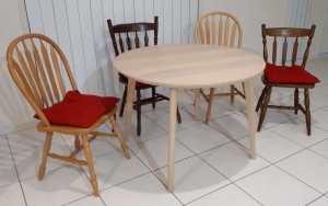 Round dining table, ca. 2 years old. Purchased new from Ikea.