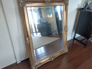 Large ornate mirror.