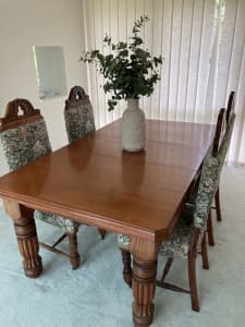 Antique dining table and six chairs