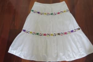 Beautiful size 12 cotton skirt with embroidered and lace trim. Lined.