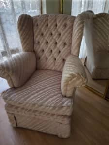 Winged back armchair