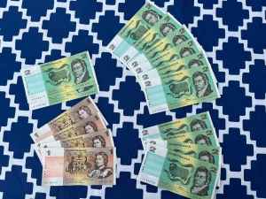 Australian $2 two dollar and $1 one dollar banknotes
