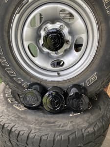 Genuine Landcruiser steel rims and tyres - set of 4 . 