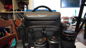 Sony Cameras, lenses, remote tripod, batteries, charger, large bag...