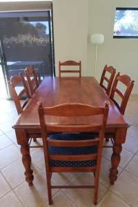 Wooden table with 6 chairs