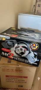 Mad catz 2 racing wheel and pedals for PS2 console