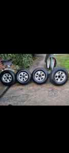 Set of 4x nissan AT SUV wheels and tyres 99% tread