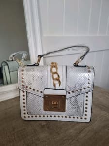 Luxury white and gold handbag
