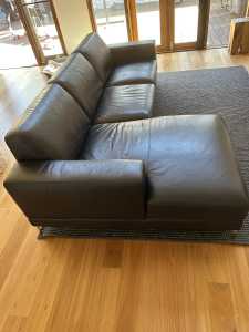 Black leather 3 seater couch hardly been used no damage done to couch