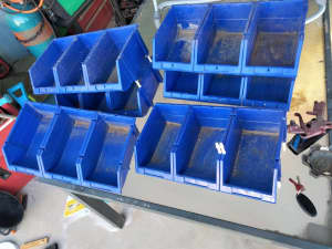 Heaps of blue storage tubs