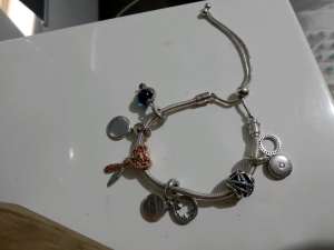 Pandora snake charm bracelet with charms
