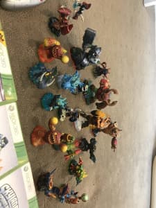 Two Xbox 360 controllers, five Xbox 360 games, 19 Skylanders