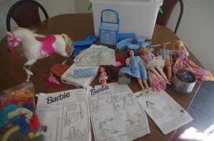 Collection of Barbies including accessories