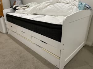 Single bed with storage drawers and trundle