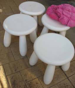 Kid chairs. Four white IKEA stools.