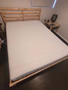 Ikea queen bed with firm foam mattress - very good condition