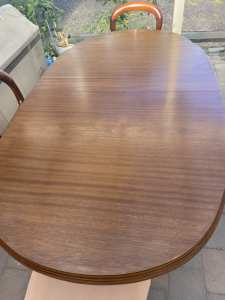 Wooden dining extendable table
