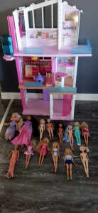Barbie doll house and dolls 