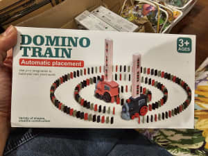 domino train automatic placement