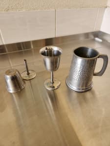 Pewter goblets and mug