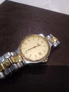 1980s Longines Conquest gold/ss quartz bracelet watch