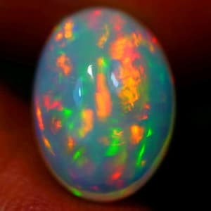 3.8ct Natural Stunning Patchwork Rolliing Pattern Welo Opal Gemstone .