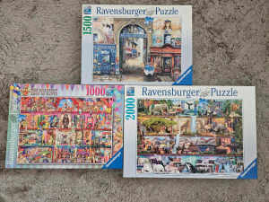 Selection of three Ravensburger jigsaw puzzles (1000, 1500, 2000 pcs)