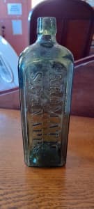 Udolpho Wolfe's Aromatic Schnapps Green Glass Bottle