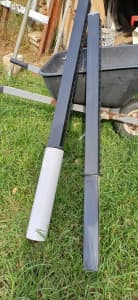 2 Black powder coated posts and PVC sleeves