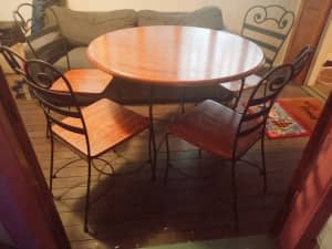 Cast iron and wood table and chairs