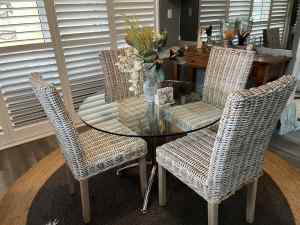 Glass Round Dining Table With Two Cane Chairs