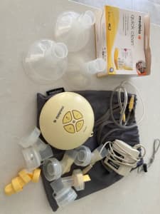 Medela swing breast pump and accessories