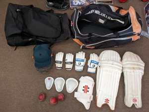 Junior cricket gear - gloves pads helmet