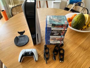 Playstation 5 with controller and games