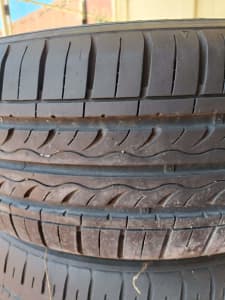 three 205/60/R16 rims and tyres