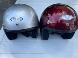 Pair of medium sized THH helmets