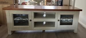 White and timber TV cabinet with lead light doors