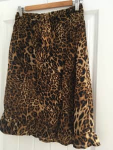 Ladies knee length animal print skirt with frill $2 size 8