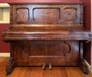 Free Ronisch piano with minor cosmetic damage.