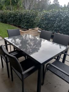 Glass top outdoor setting with 5 chairs