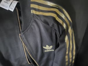 Brand new Adidas jacket small mens