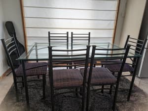 glass dining table and 6 chairs cash and pick up only genuine buyers