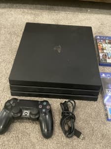 PS4 Pro console 1TB with controller and games