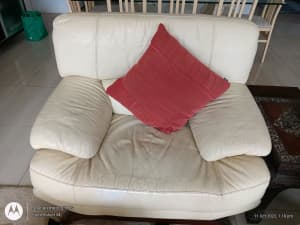 2 White solid leather Italian made armchairs $50 each