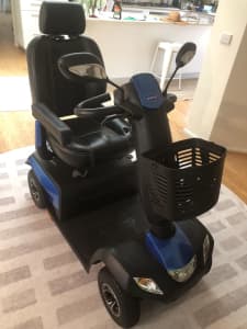 Mobility scooter with threshold ramp- immaculate condition