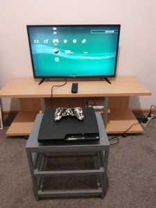 mod/upgraded 1TB PlayStation 3, TV, and TV Caninet