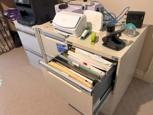 Three file cabinets in very good condition
