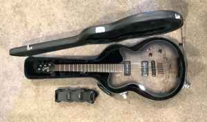 Godin LG P90 guitar, made in Canada and a Gibson case.