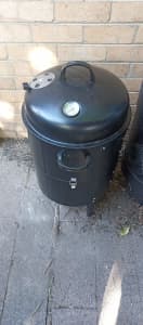 bbq smoker and fire place combo both dark metal both from bunnings